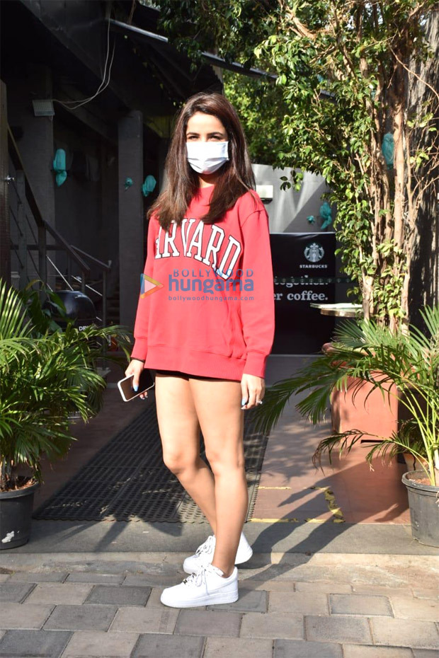 Jasmin Bhasin looks adorable in oversized red sweatshirt and sneakers