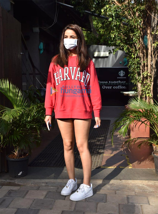 Jasmin Bhasin looks adorable in oversized red sweatshirt and sneakers