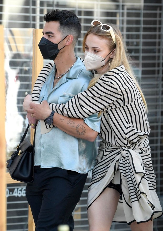 Sophie Turner dons striped wrap dress during Mother's Day outing with husband Joe Jonas