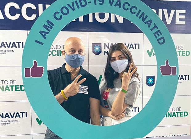 Kajal Aggarwal takes the first jab of COVID vaccine; bumps into Anupam Kher at the vaccination center