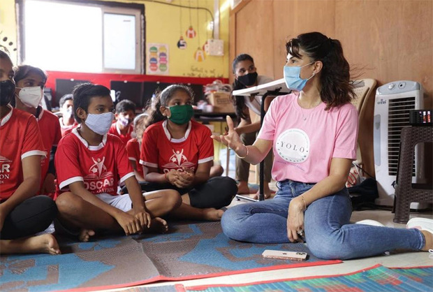Jacqueline Fernandez interacts and plays with children at the OSCAR Foundation