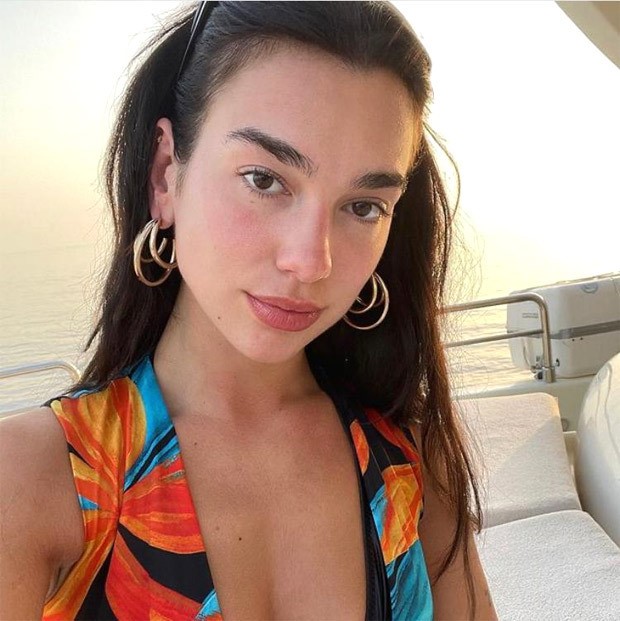 Dua Lipa sizzles in black bikini as she dives into water with boyfriend Anwar Hadid