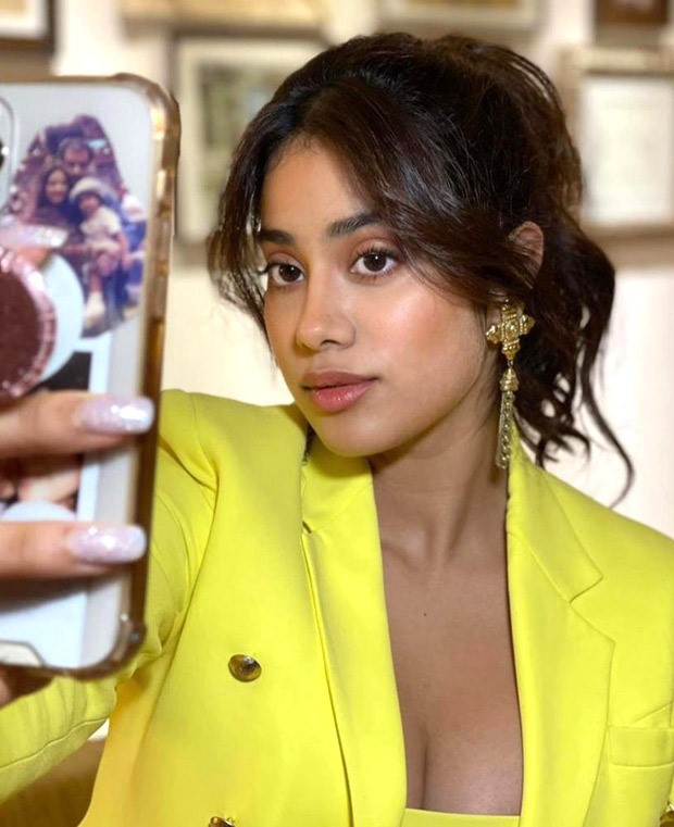 janhvi kapoor is all about maximalism in monotone co-ord set – yellow crop top, mini skirt and jacket