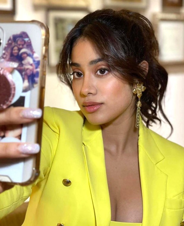 janhvi kapoor is all about maximalism in monotone co-ord set – yellow crop top, mini skirt and jacket