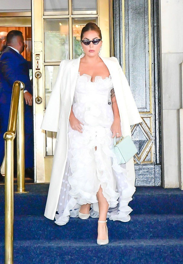 Lady Gaga looks sensational as she steps out in New York in white Giambattista Valli sheer gown 