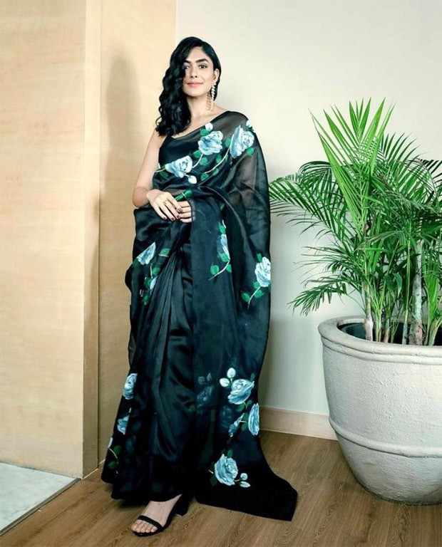 Mrunal Thakur stuns in black printed organza saree worth Rs. 19,500