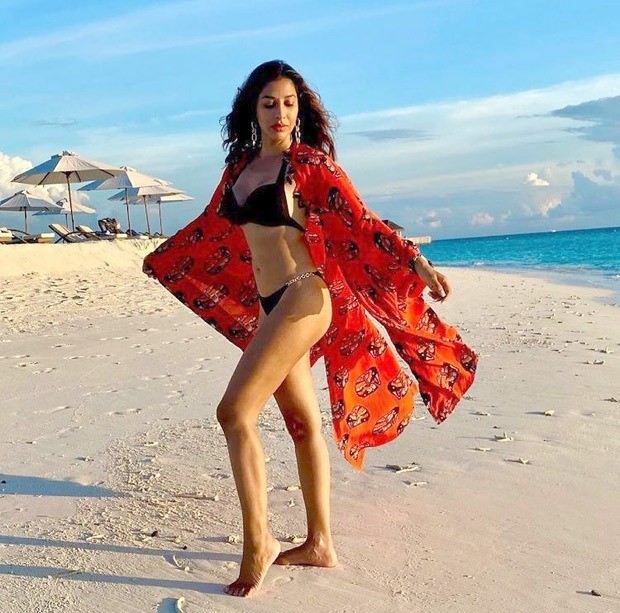 sophie choudry sizzles in skimpy bikini paired with printed cape