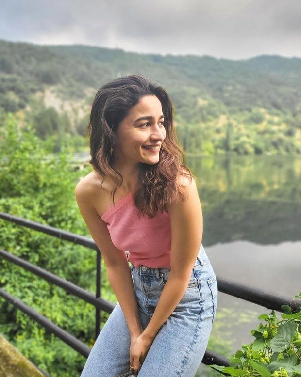 alia bhatt shares sunkissed pictures of her posing by the lakeside in a pink off-shoulder top