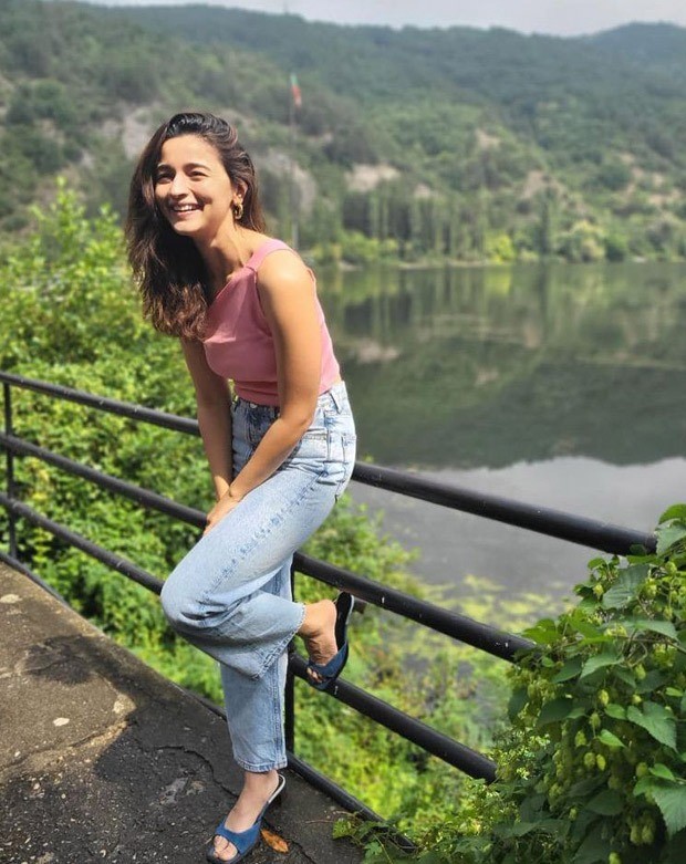 alia bhatt shares sunkissed pictures of her posing by the lakeside in a pink off-shoulder top