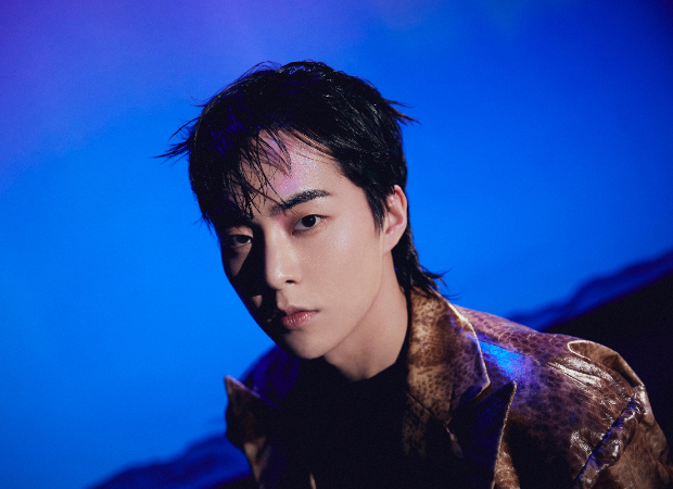 EXO's Xiumin tests positive for COVID-19; group members self-isolate as they wait for their results 