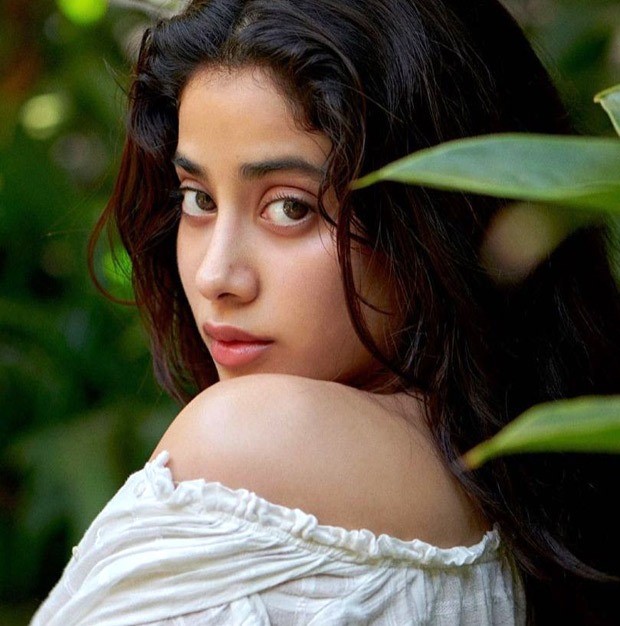 janhvi kapoor gives a smouldering look dressed in white shirt