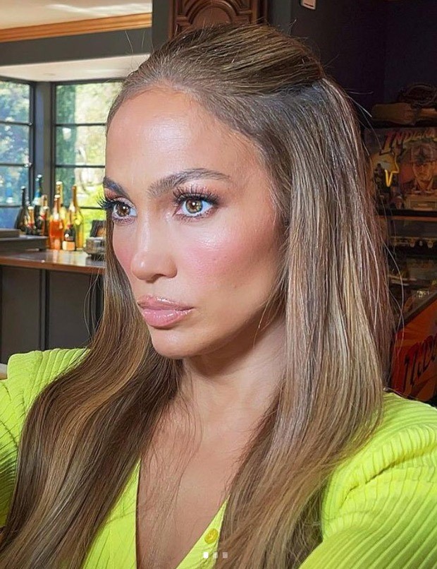 jennifer lopez looks ravishing in a neon dress