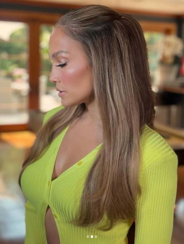 jennifer lopez looks ravishing in a neon dress