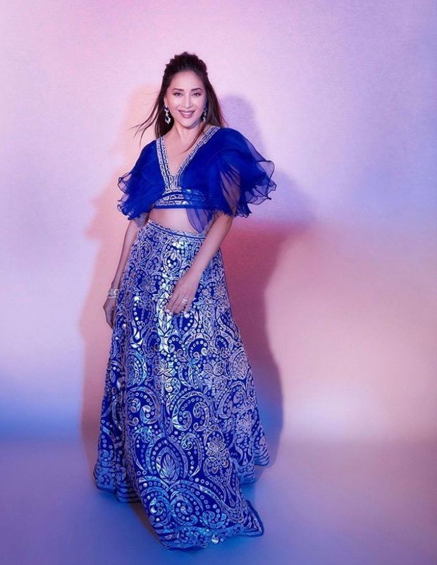 madhuri dixit is the epitome of royalty in a blue abu jani sandeep khosala creation