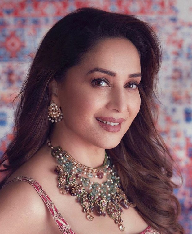 madhuri dixit looks gorgeous in a cherry red gharara from punit balana worth rs. 75,000