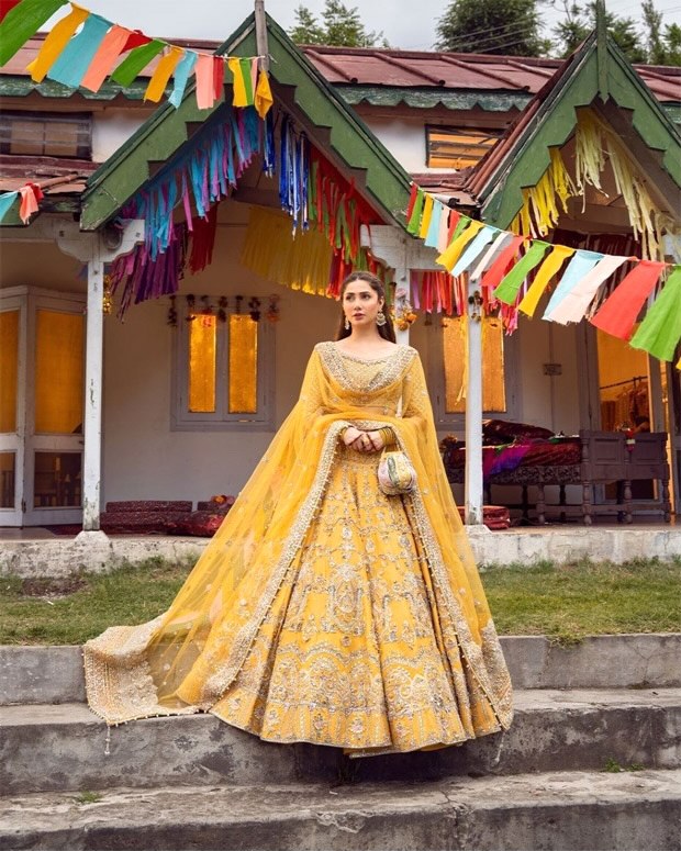 Mahira Khan gleams in abundant charm in embroidered yellow lehenga worth Rs.2 lakh