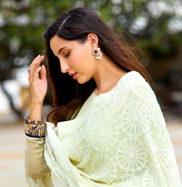 nora fatehi makes a splash in pastel lime anarkali suit with a heavily embroidered dupatta