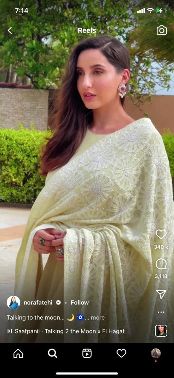 nora fatehi makes a splash in pastel lime anarkali suit with a heavily embroidered dupatta