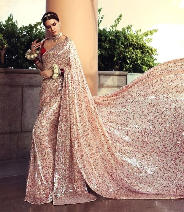 kriti sanon is struck by burst of sequins in embellished manish malhotra saree from nooraniyat collection