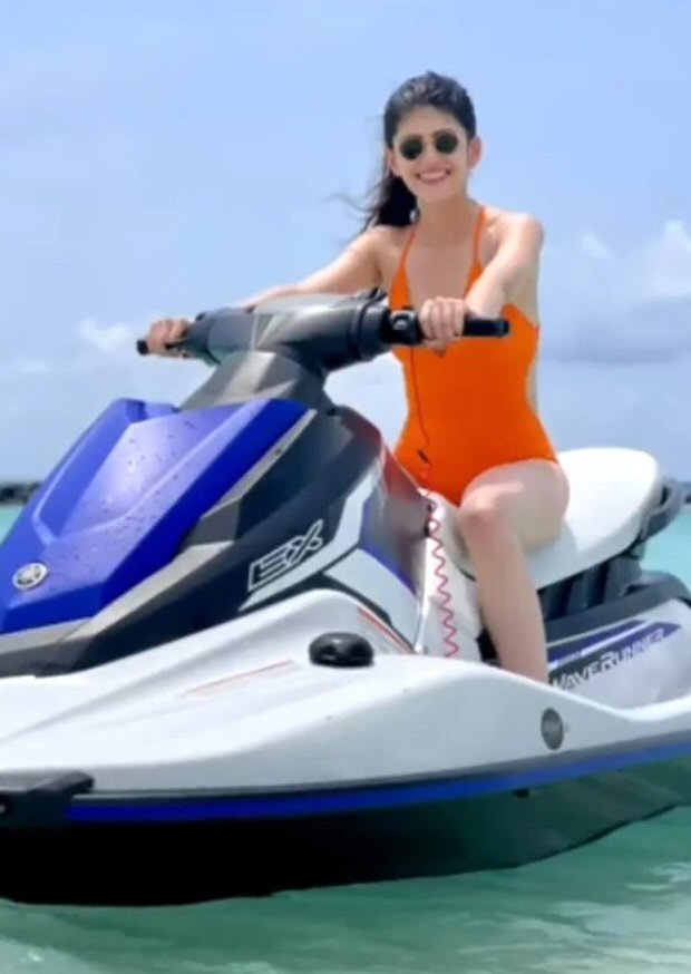 Sanjana Sanghi makes a splash in orange swimsuit while holidaying in Maldives