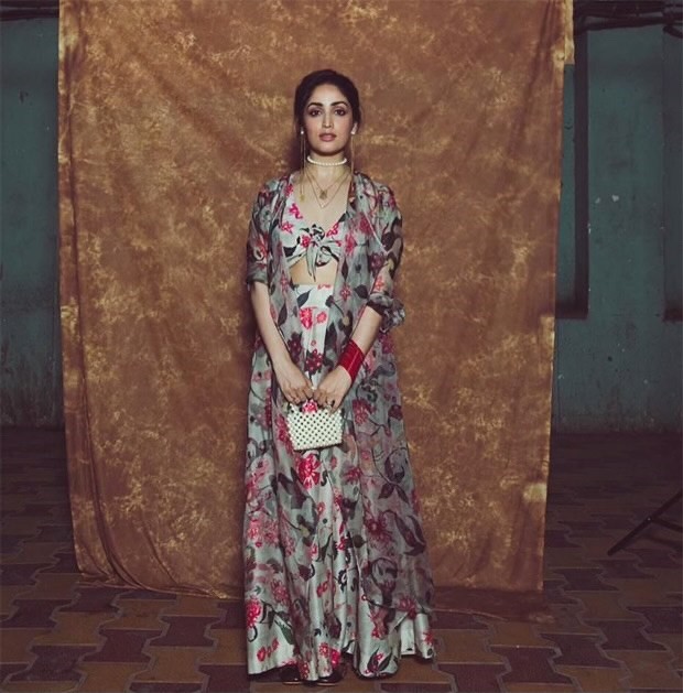 yami gautam looks mesmerising in a beautiful floral printed skirt and blouse styled with a matching coat