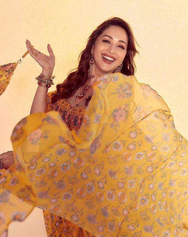 madhuri dixit channels major easy breezy vibes in a yellow set worth rs. 42,500