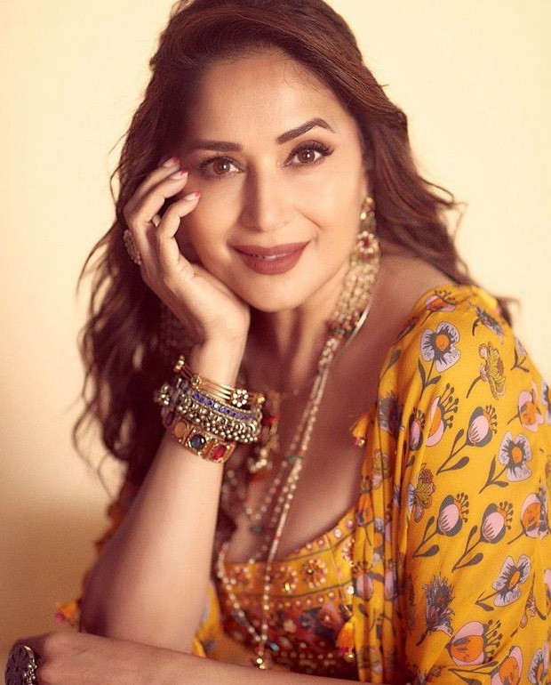 madhuri dixit channels major easy breezy vibes in a yellow set worth rs. 42,500