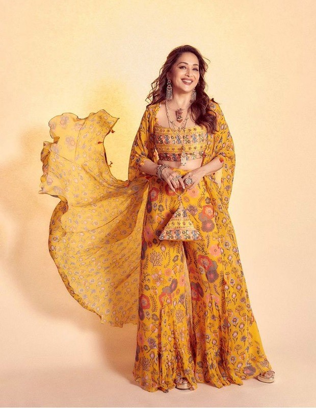 madhuri dixit channels major easy breezy vibes in a yellow set worth rs. 42,500