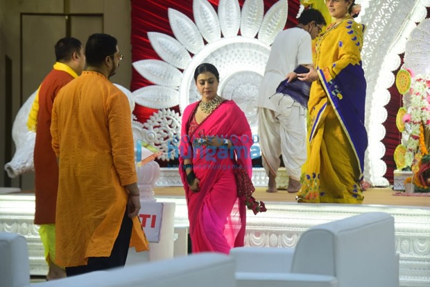 Kajol stuns us in bright pink saree during Durga Puja