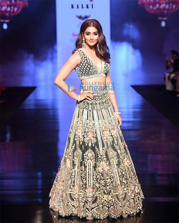 Pooja Hegde looks ethereal as the showstopper in a palace green velvet lehenga at Bombay Times Fashion Week 2021