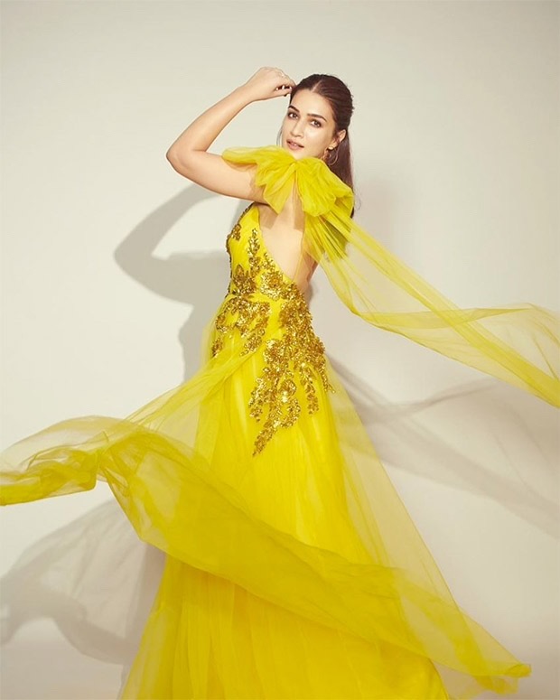 kriti sanon looks radiant in mesmerising lime yellow one shoulder gown for hum do humare do promotions