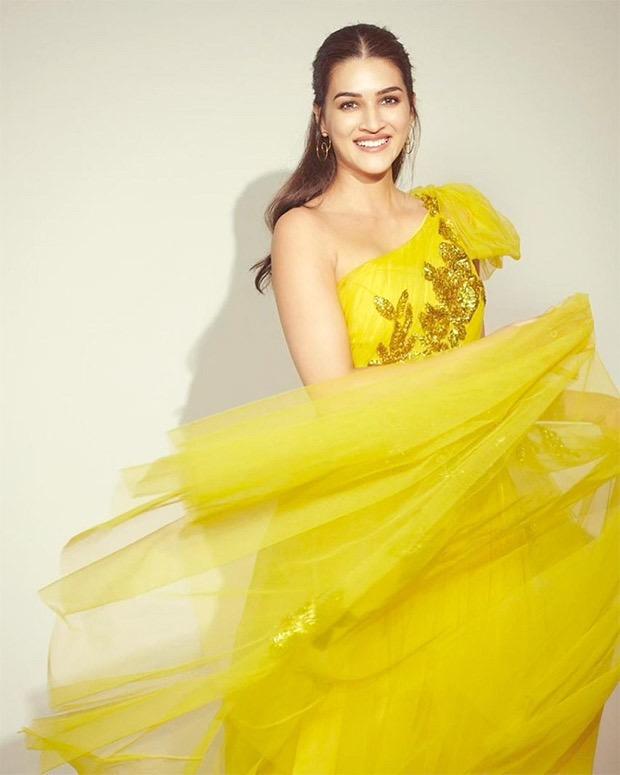 kriti sanon looks radiant in mesmerising lime yellow one shoulder gown for hum do humare do promotions
