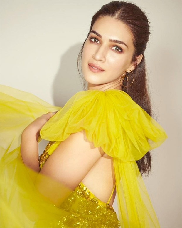 kriti sanon looks radiant in mesmerising lime yellow one shoulder gown for hum do humare do promotions