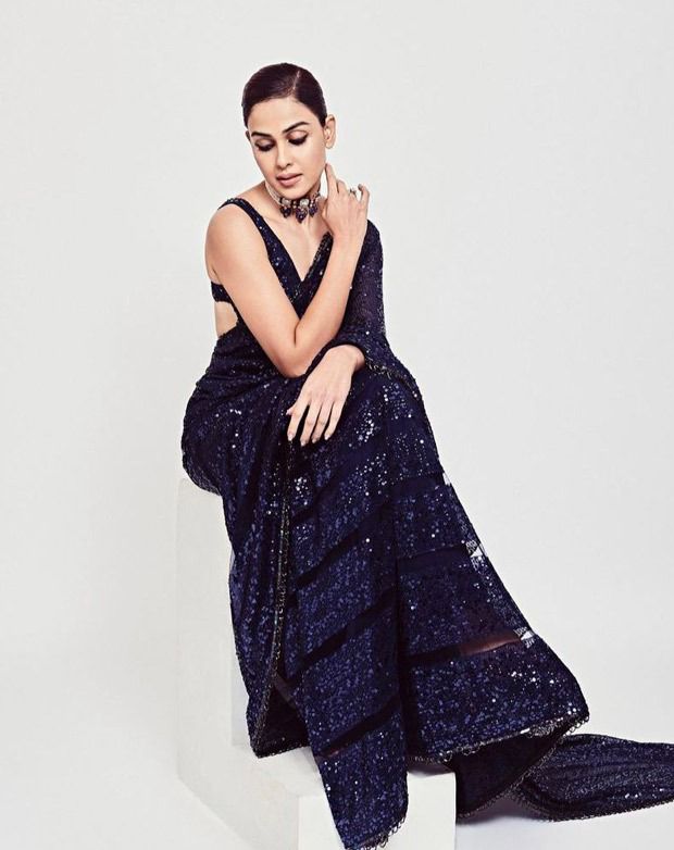 genelia deshmukh keeps it classic in a sequin black saree