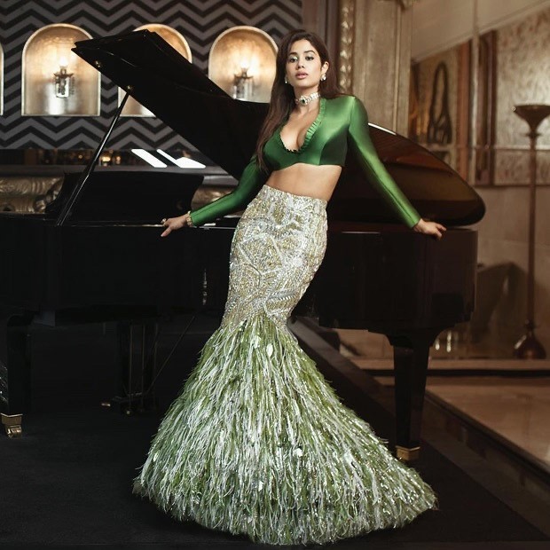 janhvi kapoor is all about grace and charm in alluring mermaid style feathered manish malhotra green lehenga