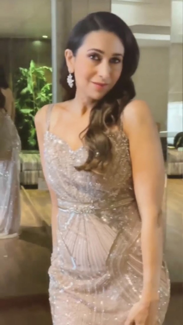 karisma kapoor looks exquisite in embellished silver gown
