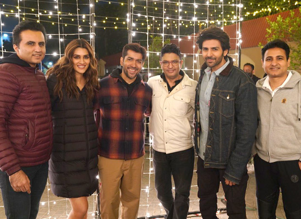 kartik aaryan and kriti sanon starrer shehzada’s team huddles up to commence the night schedule of the film.