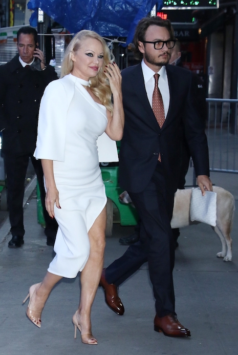 pamela anderson’s “manager” looks familiar
