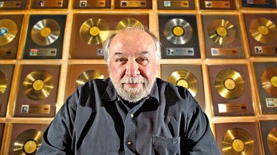 Bernie Finkelstein with a few of his record awards (CBC photo)