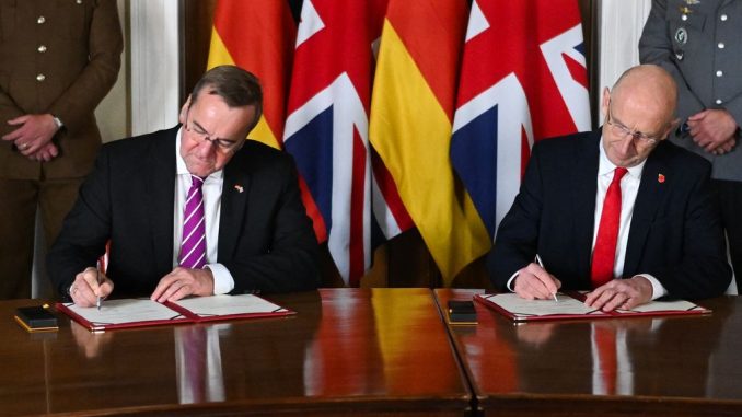 British and Germans sign 'historic' defense pact, will make weapons together historic' defense pact